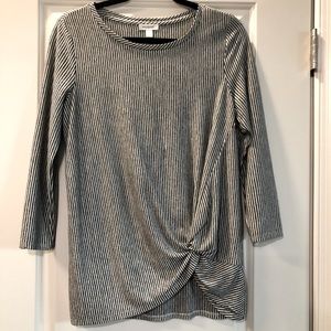 Woman’s gray & white striped top